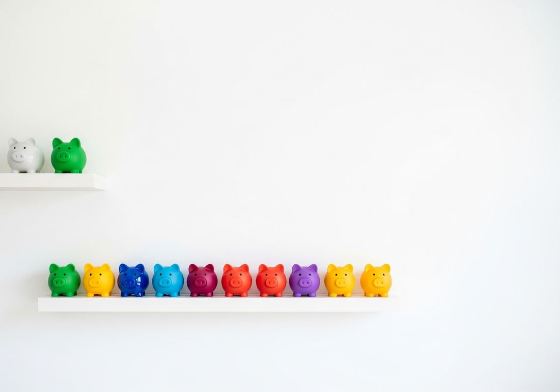 Schweizer Franken-Münzen und Sparschwein